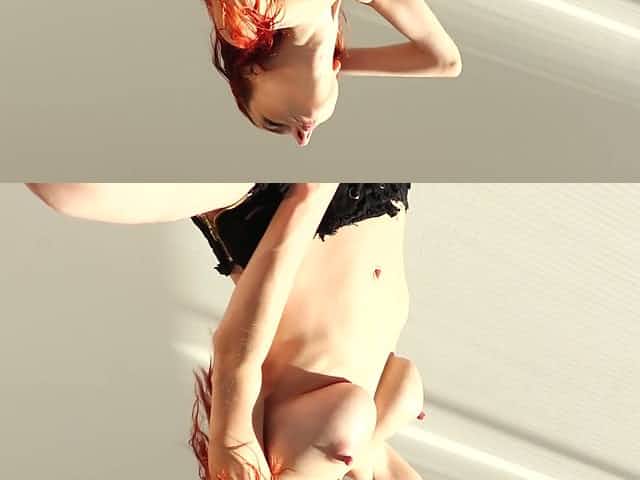 Mesmerizing red haired Helga Grey plays with her juicy big boobies