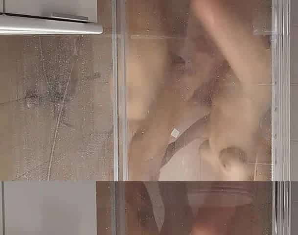 Young girl in pigtails takes a shower and loses her panties