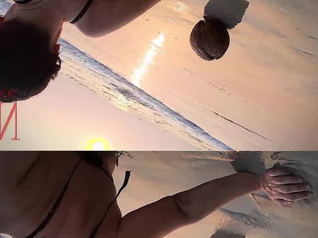 Worthwhile lady at lonely nudist beach. Red swimsuit. Red bikini. Coconut