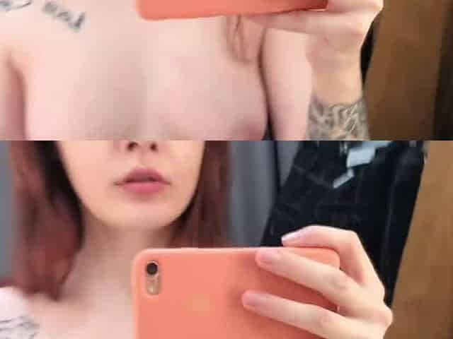 Redhead student solo wanks naked in fitting room, fantasizing messy doll sex.