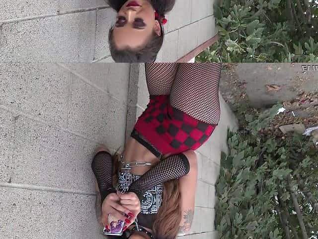 Tattooed bimbo Holly Hendrix is on her knees sucking a cock
