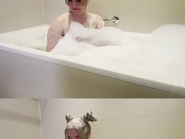 Foamy bathtub sex on business journey