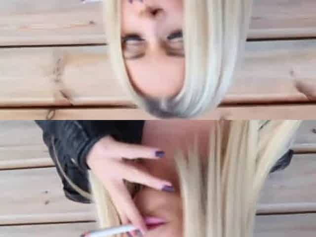 blonde girl smoking leather showing tits