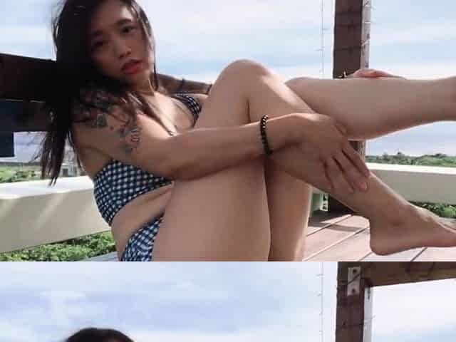 Long-Legged Beauty Shows Off by the Seaside