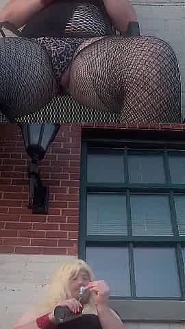 Sissy doxy playing with bbc sextoy in public