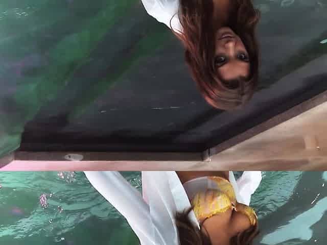 Teen reveals her pussy under the water