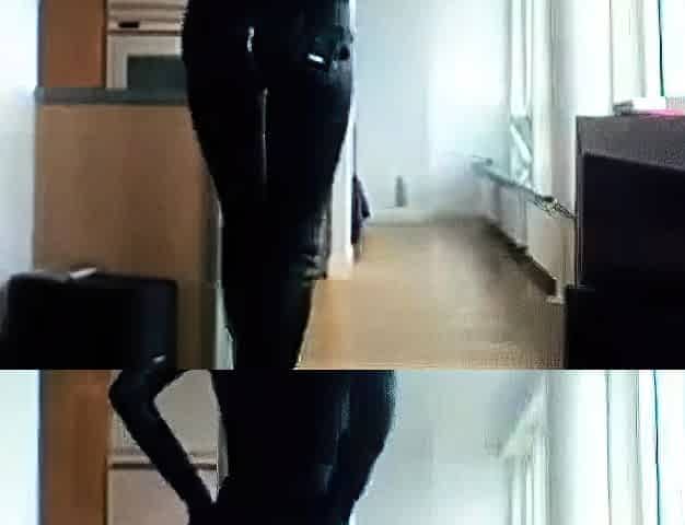 Smoking Hot Brunette Milf in Latex Catsuit and Boots