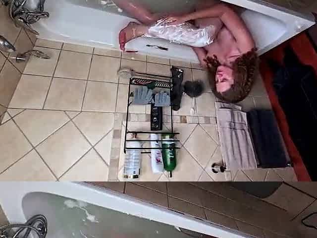 Shaving my legs in the bathtub