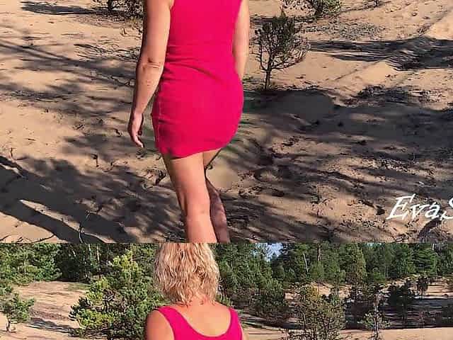 golden-haired pissing standing on all fours in the street