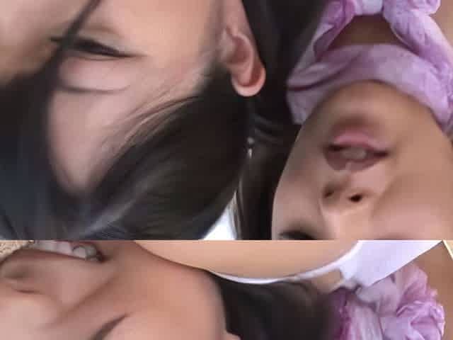 Busty Asian lesbians licking and fingering one another