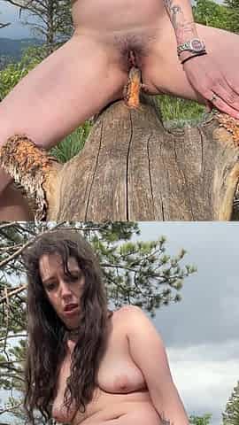 Freak of nature puts log in pussy to masturbate