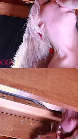 Blonde Babe Sucks Cock Under the Milking Table