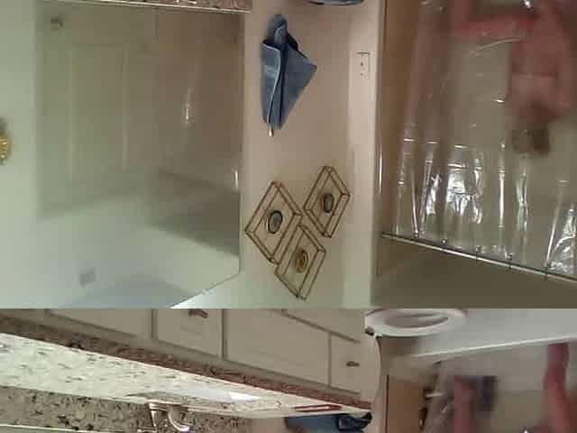 Blonde masturbates and cums hard with a showerhead standing, takes a selfie of her pink pussy after