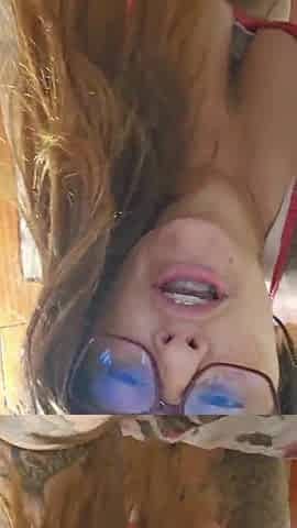 Redheaded married woman makes a clip call with a fan and shows her snatch.