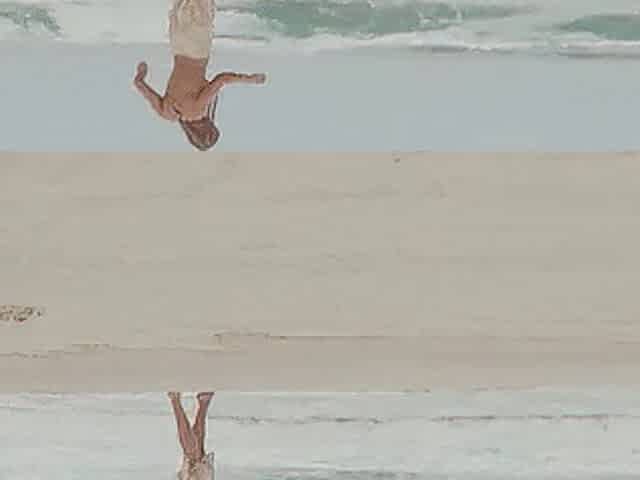 Slender Australian MILF strips naked at the beach and exposes her juicy boobs