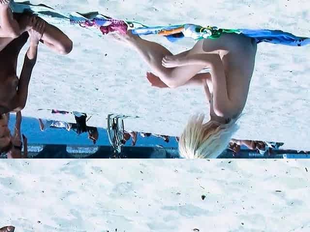 Beautiful blonde nudist sunbathe her trimmed pussy