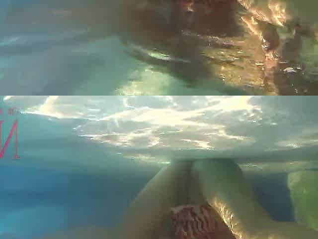Elegant and supple playgirl, swimming underwater in the outdoor swimming pool. three 1