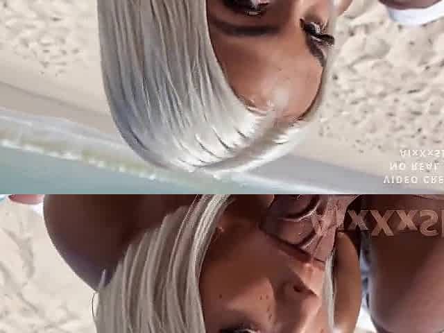 A Black angel has sex on the beach with a large ebony weenie.(AI Generated)