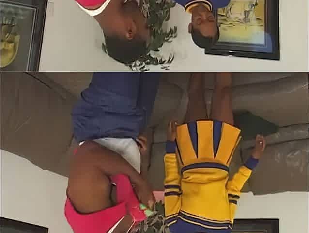 Hot black cheerleader bangs fan in the living room