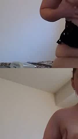 Teen lotions and rubs her tits