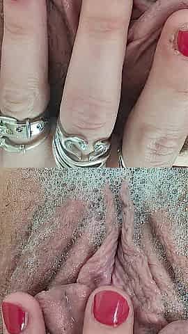 Rubbing stretching pulsing pink cunt in washroom close up