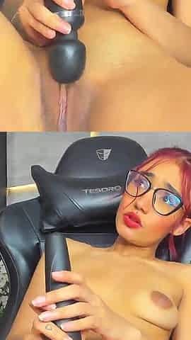 Girl with glasses and colored hair dances and is controlled by a fan with a Lovense Toy P1