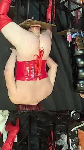 Red corset and haunch-high boots and biggest