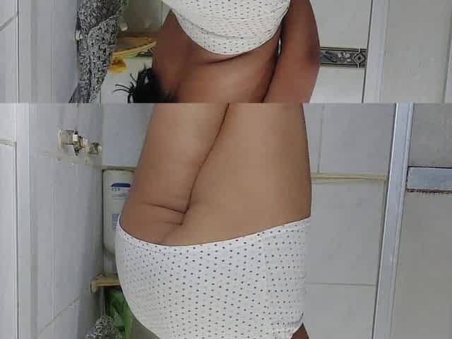 Wet Effect: Her White Skirt Becomes Transparent and Reveals Her Pink Thong
