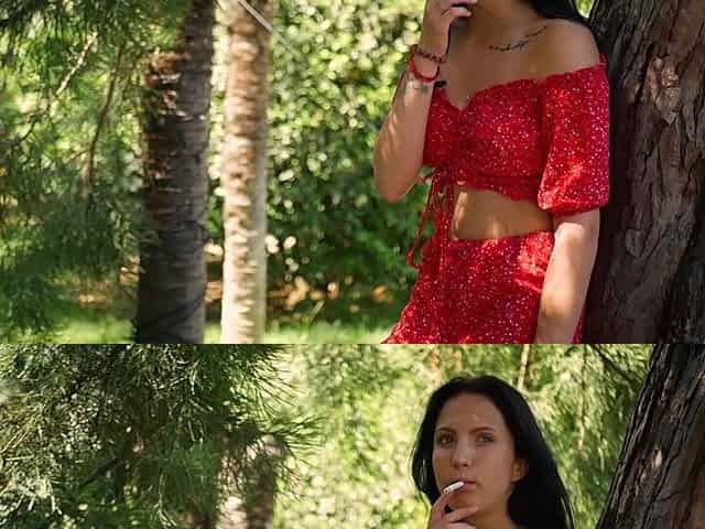 Seductive Russian Beauty Smoking Slim Cigarette Outdoors