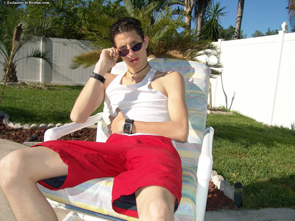 British gay hottie Lukas strips poolside and plays with his huge dick — Full Story