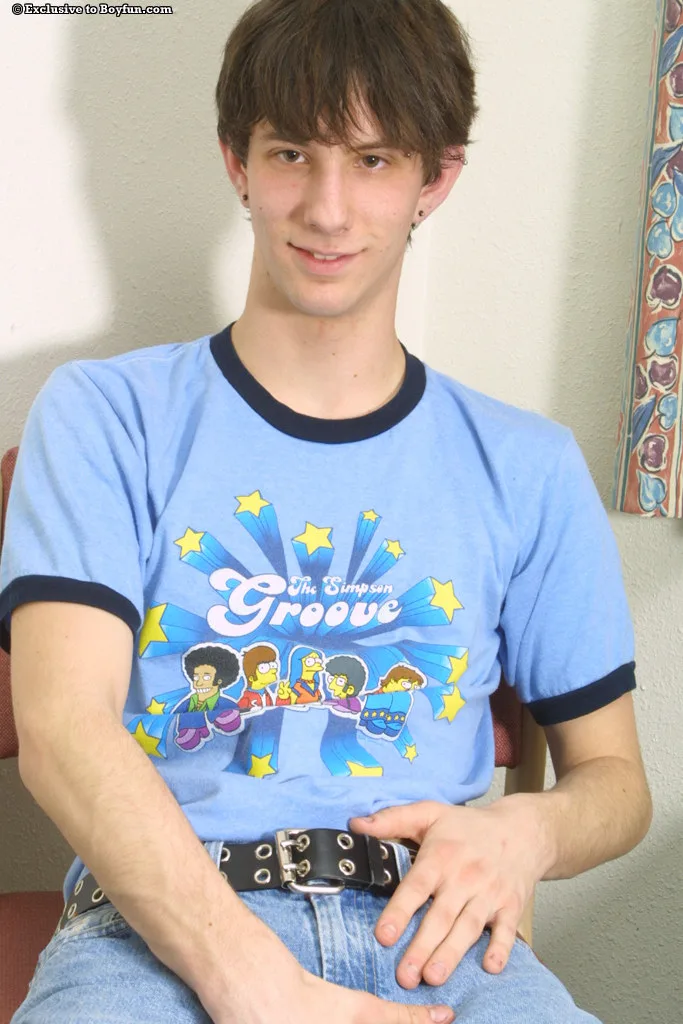 Editors’ Pick: Young gay brunette Stanley shows his pierced nips and masturbates on a chair — A Closer Look