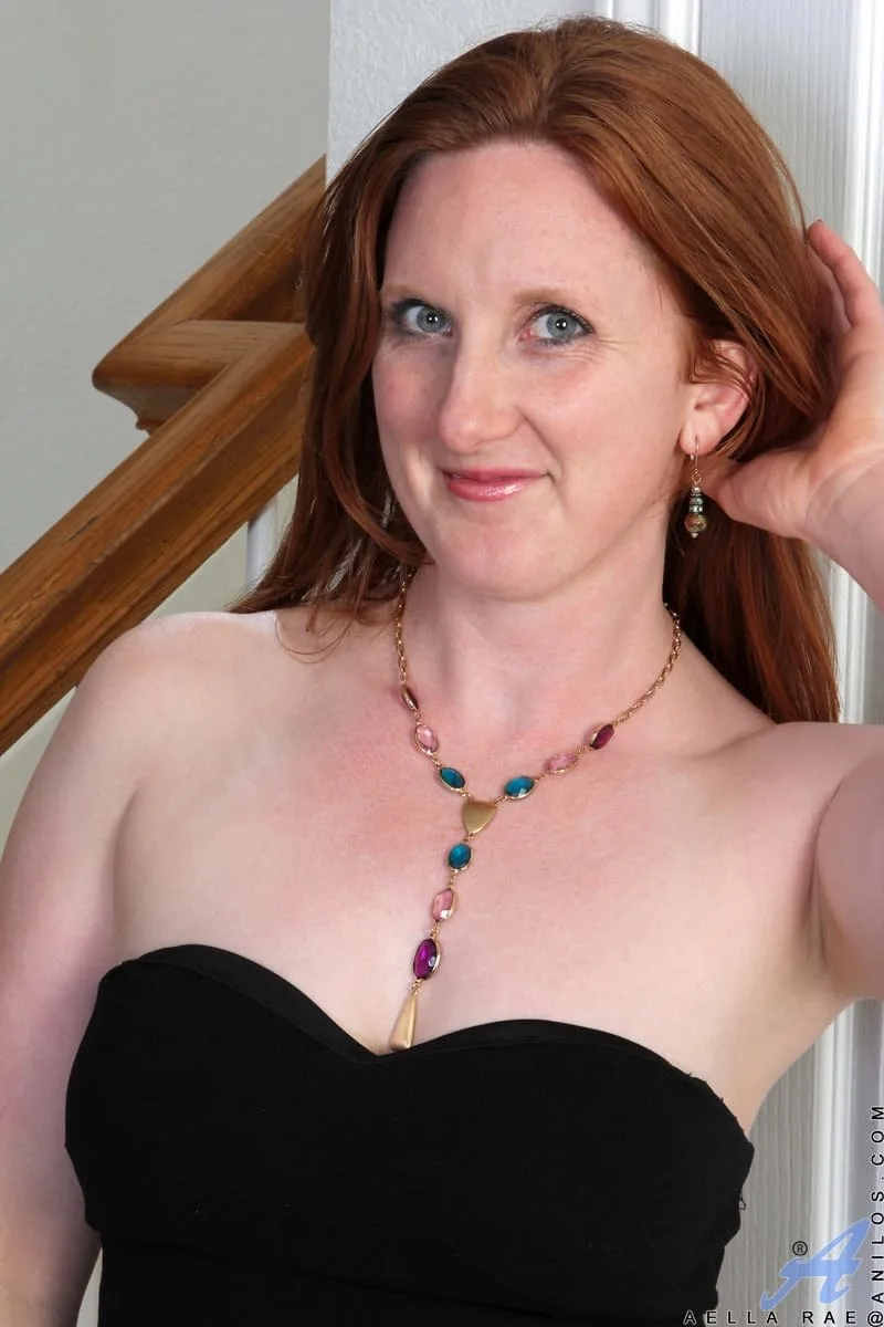 A Closer Look at Natural redhead Aella Rae discards a black dress for her first nude session — Worth Exploring